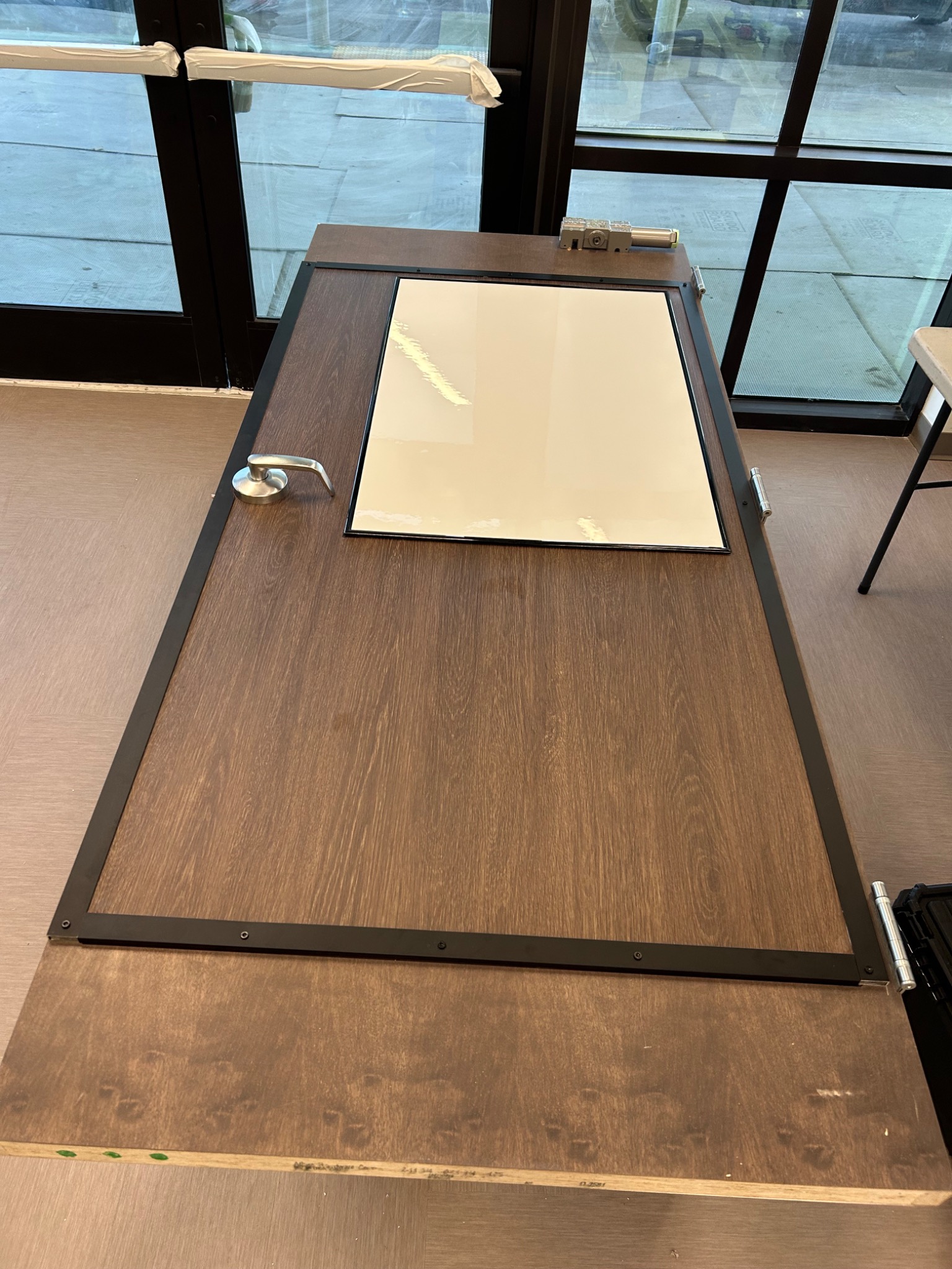 Door Sentry retrofit panel during fit-up